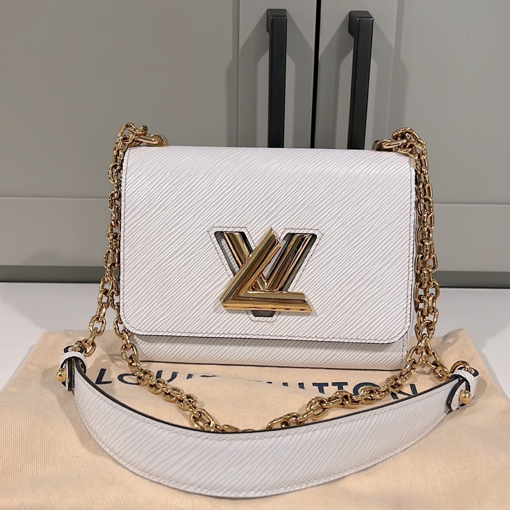 Authentic Louis Vuitton White Epi Leather Twist MM